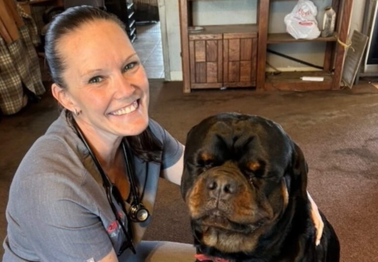 Doctor and puppy sitting together